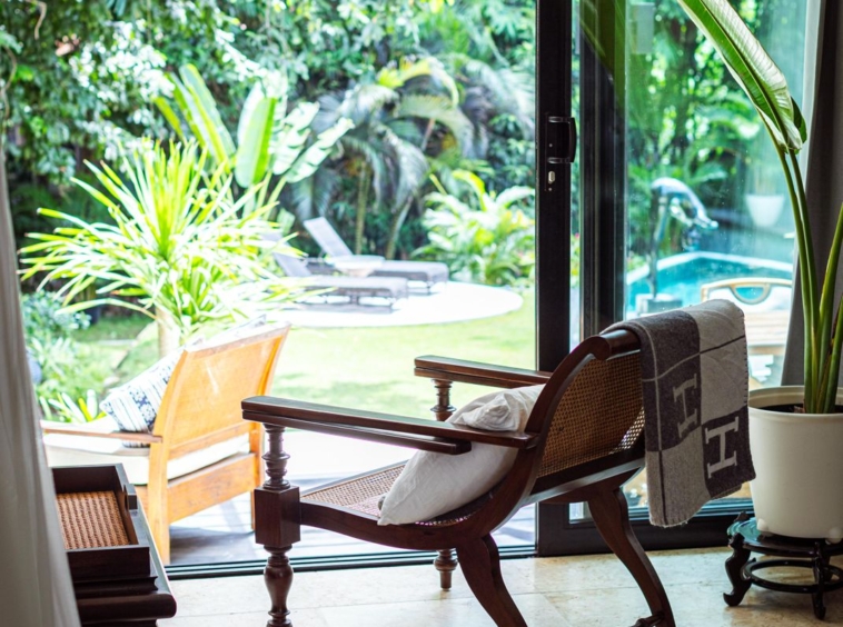 master bedroom with garden swimming pool view