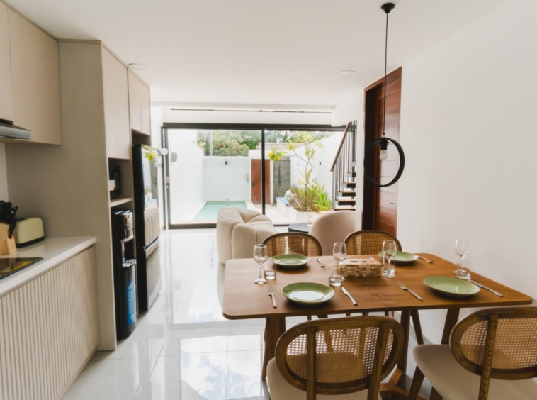 dining space and living room open or enclosed to uour private swimming pool