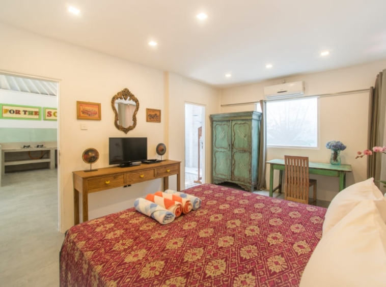 1 of the 4 spacious bedrooms