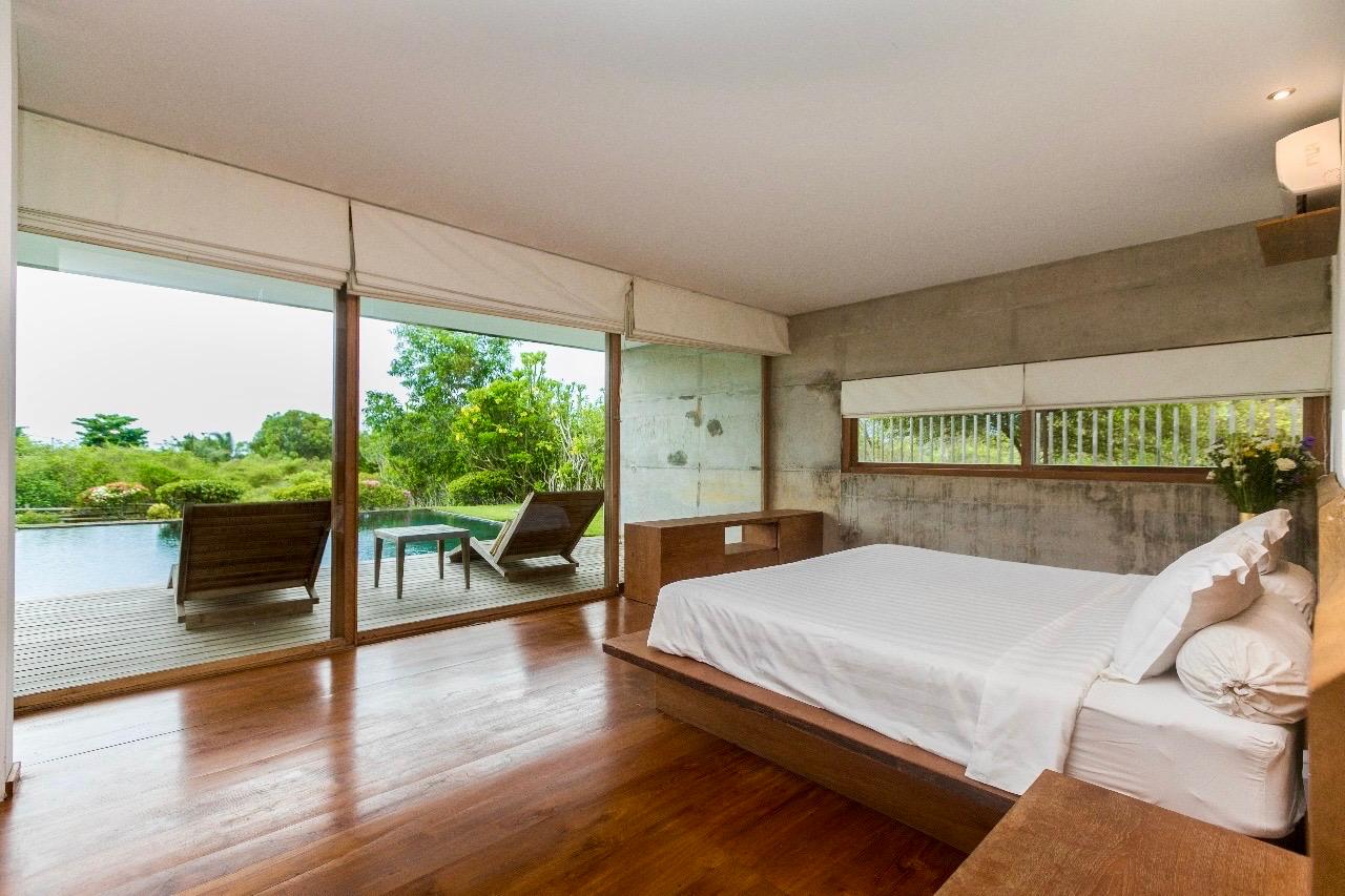 amazing bedroom with Wooden flooring
