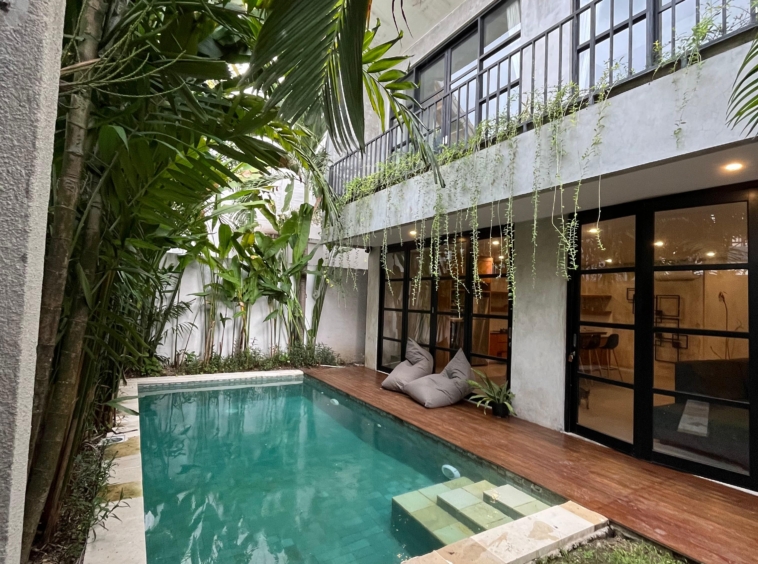 Private pool surrounded by lush greenery