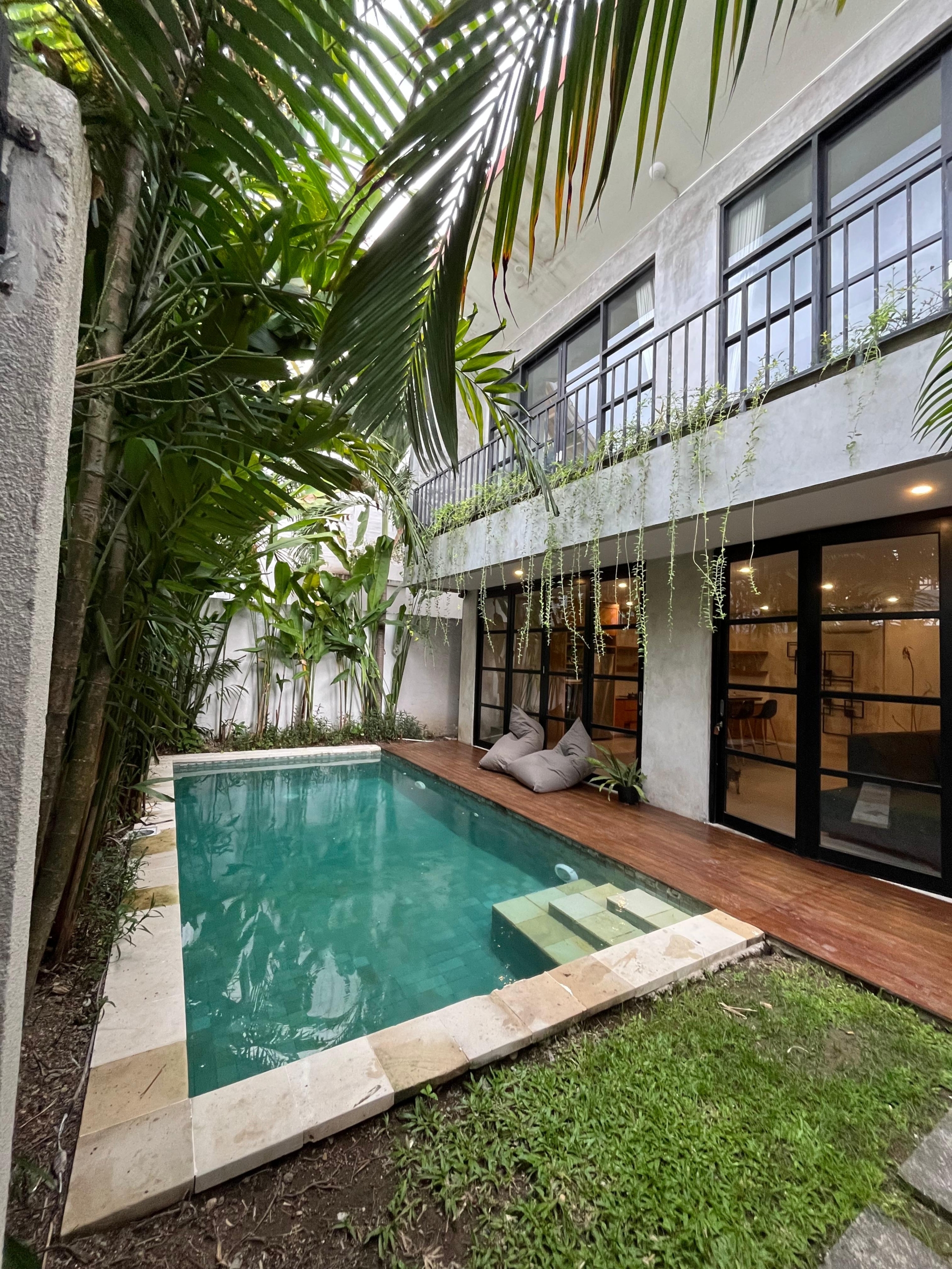 Private pool surrounded by lush greenery