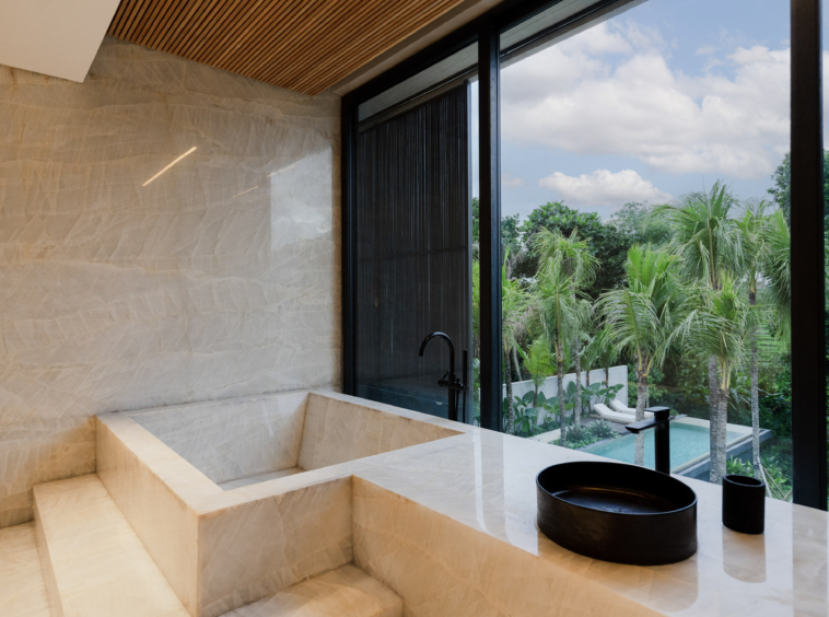 full marble in the bathroom of th emaster bedroom