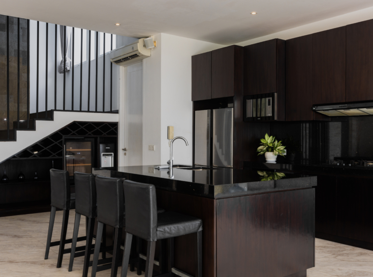 zoom to the kitchen with bar style chairs