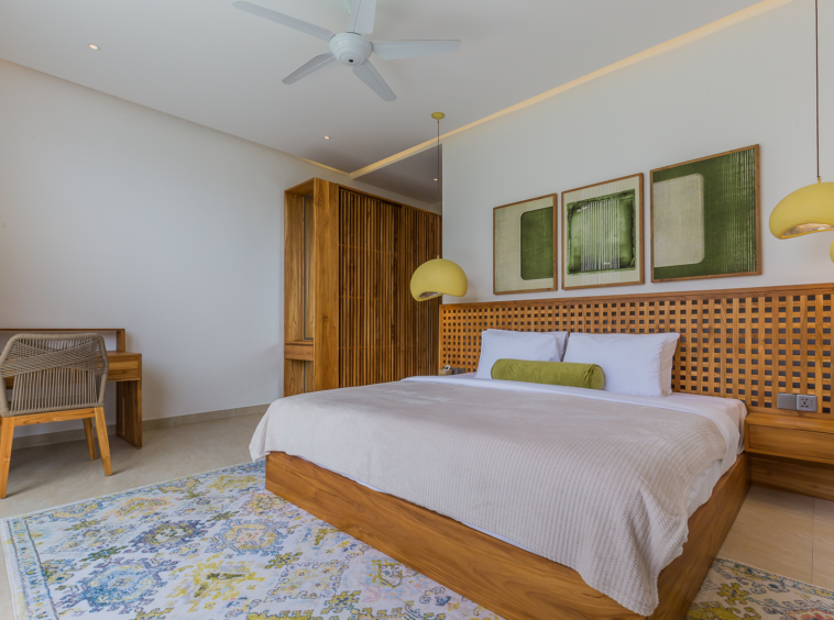 Second bedroom with custom wood furniture in Luxury 3 Bedrooms Villa in Prime Umalas