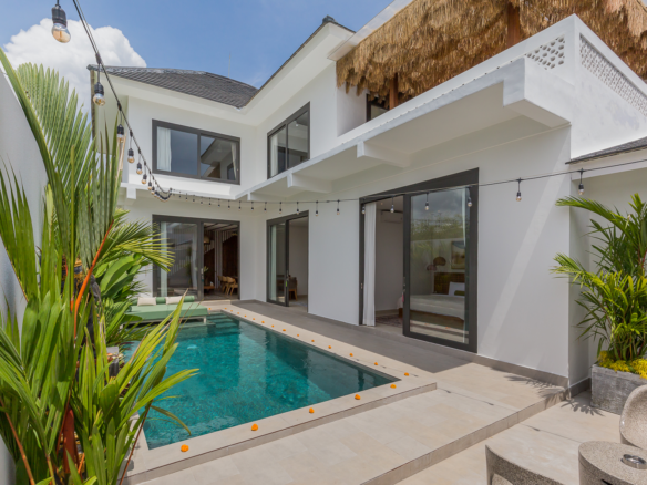 Private swimming pool area with tropical plants in Luxury 3 Bedrooms Villa in Prime Umalas